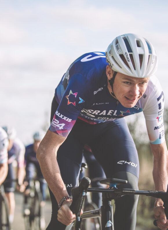 Sage-LLC-Factor-Zhonglu-VisionStone-Man-on-Bike-Race-Homepage